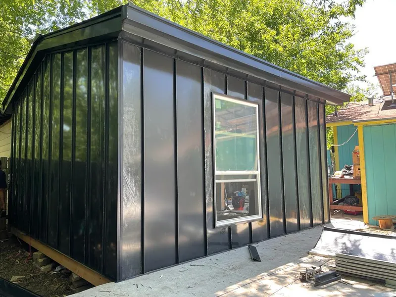 Black standing seam metal wall panels for Roof Inspection in Albion